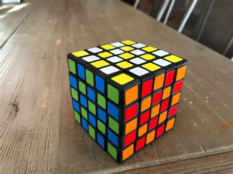 how to solve a 4 square rubik's cube|solve 4 sided rubik's cube.